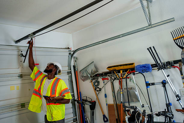Professional Garage Door Installation technician working in Champaign, IL